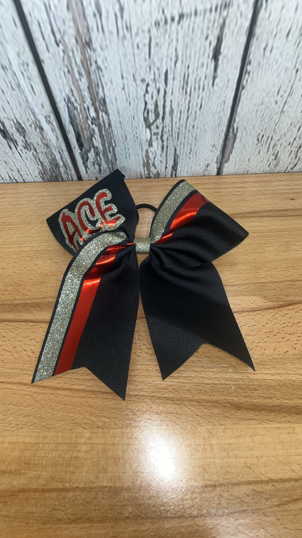 ACE silver and red practice bow